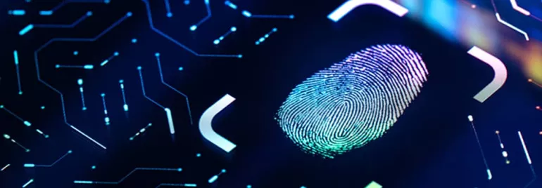 Close-up of a digital fingerprint on a glowing circuit board.