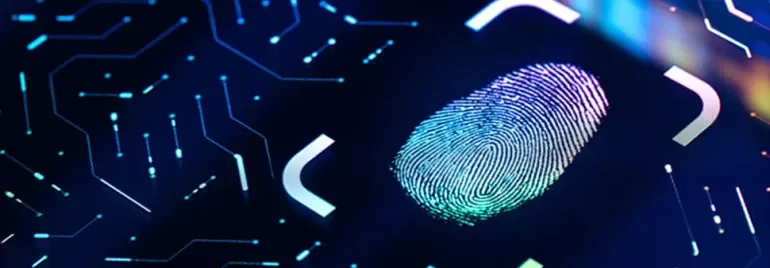Close-up of a digital fingerprint on a glowing circuit board.