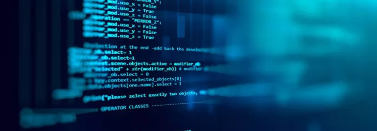 Close-up of a blue-toned computer code on a screen.