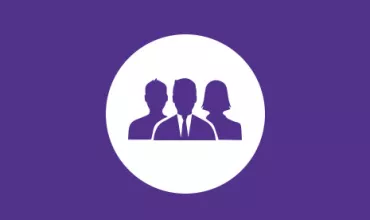 Silhouette of three people on a purple background.