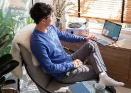 man sitting on a chair 