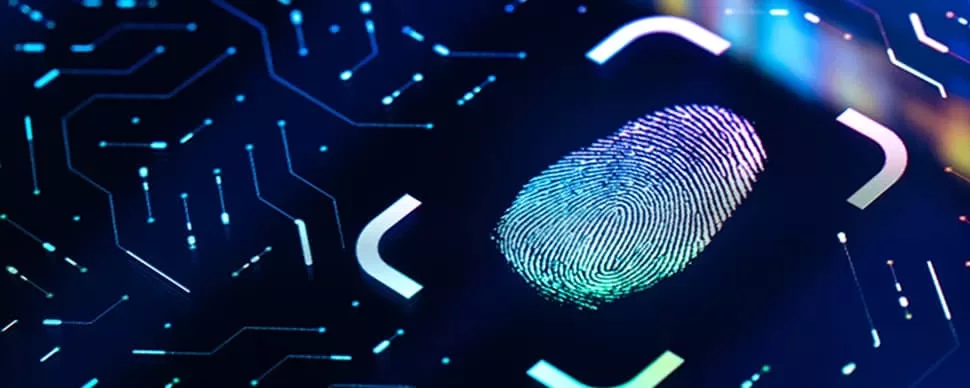 Close-up of a digital fingerprint on a glowing circuit board.