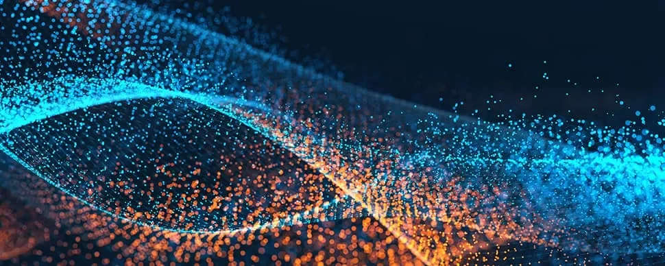Abstract digital wave with blue and orange particles on a dark background.