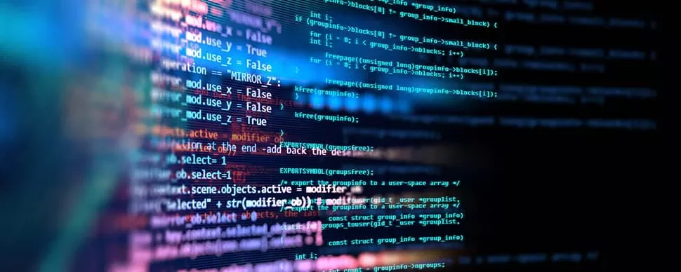 Colorful computer code on a screen showing various programming scripts.