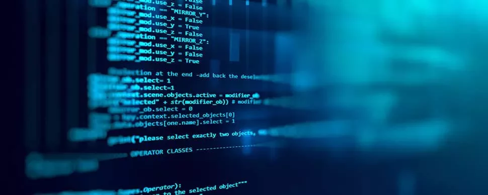 Close-up of a blue-toned computer code on a screen.