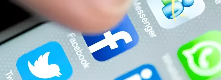 A screen of a phone with popular social media logo.